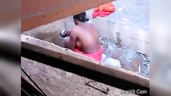 Sneaky Son Secretly Catches Desi Babe Washing Her Massive Tits Outside