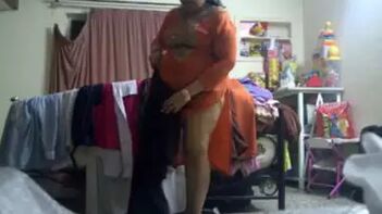 Chubby Desi Aunty Changing Clothes Caught on Hidden Cam