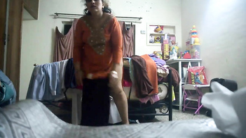 Chubby Desi Aunty Changing Clothes Caught on Hidden Cam