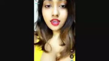 Chick Flexing Her Massive Tits in a Private Tango Session