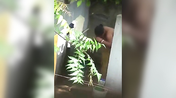 Sneaky Teen Catches Indian Neighbor Washing Her Pussy Outdoors Post-Fuck Session