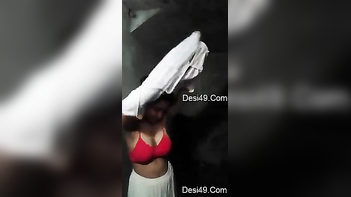 Aunty Rips Off Long Sleeve T-Shirt and Red Bra in Empty XXX Studio, Showing Tits