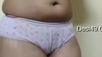 Busty Desi Nympho Dances, Strips, and Plays with Her Massive Tits