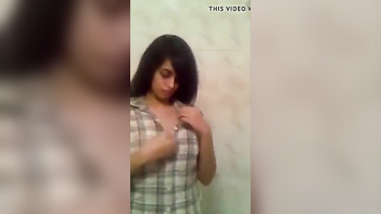 Tamil Chick Strips Down, Revealing Juicy Curves and Tight Pussy