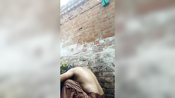 Desi Bhabi Gets Wild in Outdoor Bath, Soaking Wet and Totally Naked