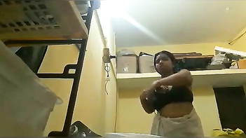 Indian Babe Flashes Tits and Slips into Black Bra in Homemade Clip.