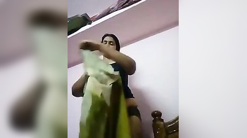 Desi Bhabi Strips Down and Changes Her Dress in Front of the Camera