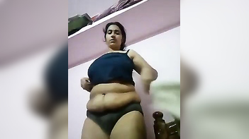 Desi Bhabi Strips Down and Changes Her Dress in Front of the Camera