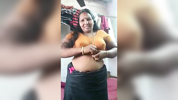Fucking Hot Desi Aunty Strips Down, Revealing Her Massive Tits and Juicy Pussy