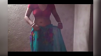 Experience Desi Passion with Hot Bhabhi Removing Saree and Standing in Inner Wears