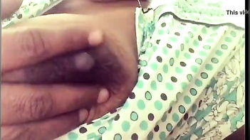 Mallu Aunty Squeezing Her Juicy Boobs In Tight Clothes
