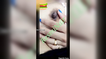 Desi MILF Teases on Cam, Playing with Her Juicy Nipples