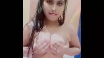 Babe Shows Off Her Juicy Tits and Pussy, Fingering Like a Pro in Selfie Action