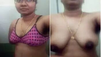 Indian Chick With Glasses Teases Her Juicy Assets In The Fucking Bathroom