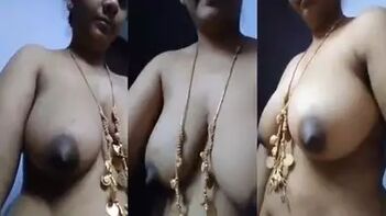 Tamil MILF Flashes Her Stunning Tits and Pussy in Steamy Home Video