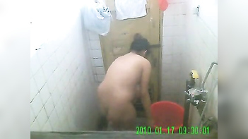 Desi Housewife Strips, Soaks, and Flaunts Her Curves in Steamy XXX Vid.