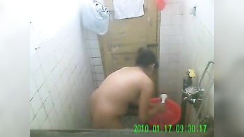 Desi Housewife Strips, Soaks, and Flaunts Her Curves in Steamy XXX Vid.