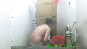 Desi Housewife Strips, Soaks, and Flaunts Her Curves in Steamy XXX Vid.