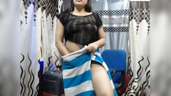 Busty Desi Bhabi Gets Her Big Boobs Bouncing on Webcam.