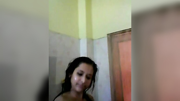 Desi Cute Girl Gets Soaped Up and Rinsed Hard in Steamy Bath Video