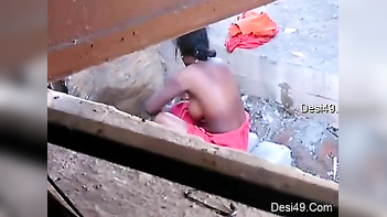 Perverted Desi Boy Filming Neighbor With Big XXX Tits Washing Outdoors