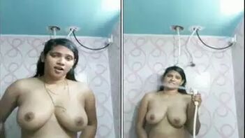 Indian Babe With Juicy Tits Satisfies Her Pussy In The Shower Room