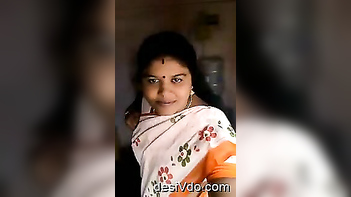 Hot South Indian Bhabhi Flaunts Her Juicy Tits and Masturbates Hard.