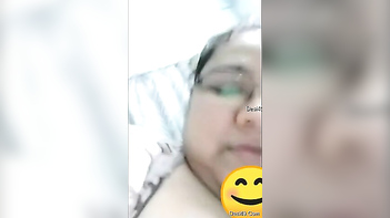 Busty Indian MILF Gets Naughty and Flashes Her Tits in Steamy Solo Session.