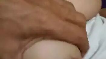 Horny Guy Ravages Indian Aunty's Juicy Naked Tits With His Paws.