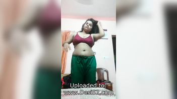 Desi Aunty Strips Naked, Revealing Her Big Tits and Juicy Pussy.