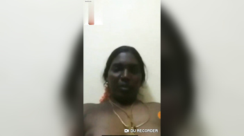 Horny Desi Tamil Aunty Flashes Tits and Masturbates on Video Call With Husband.