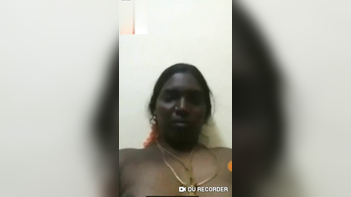 Horny Desi Tamil Aunty Flashes Tits and Masturbates on Video Call With Husband.