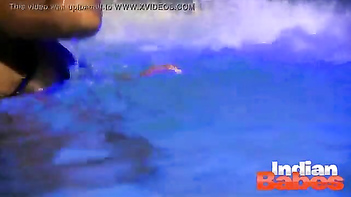 Busty Desi Babysitter Gets Naked and Wild in the Pool