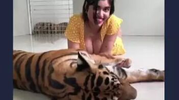 Desi Slut Flashes Her Braless Tits on a Fucking Tiger's Back.