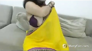 Desi Milf Struggles to Hide Her Gorgeous XXX Tits During Wild Webcam Show.