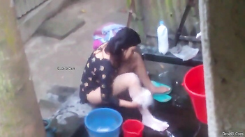 Indian MILF Scrubs Her Giant Tits and Ass Outdoors in Wild Sex Video.