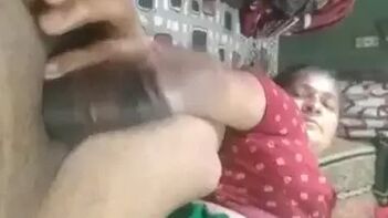 Busty Bhabhi Jerks Devar's Cock Till He Cums Hard at Home - Hot Handjob Action!