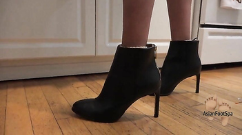 Sizzling in High Heeled Leather Boots While Whipping Up Dinner.