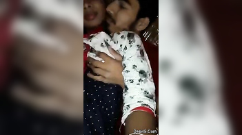 Indian Chick Gives a Sloppy Kiss and Lets Dude Grope Her XXX Tits.