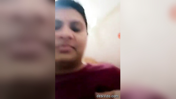 Big-Titted Desi Bhabhi Flashing Her Massive Jugs in Steamy Indian Porn Clip.