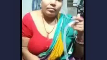 Busty Village Aunty's Wild Expose in Steamy Indian Porn Tube Video.