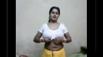 Stunning Big Boobs Desi Aunty Strips for Her Lover's Pleasure