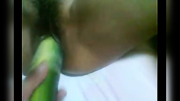 Discover the Sensual Art of Desi Bhabhi Masturbation with a Cucumber!