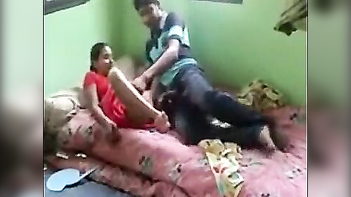 Desi Mom Takes Neighbor's Son's Cock in Steamy Indian Porn Video.