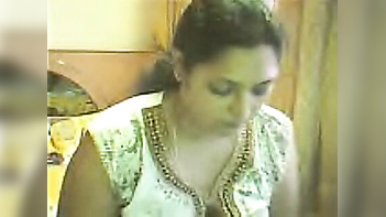 Desi Housewife's Big Boobs Exposed in XXX Video - Watch Now!