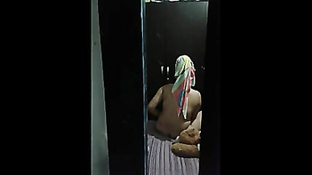 Indian Bhabhi Caught on Camera in Intimate Bedroom Moment