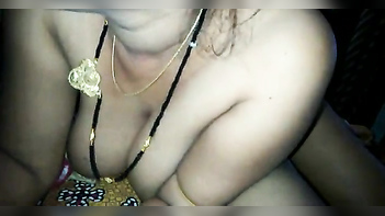 Desi Bhabhi Flaunting Her Curves in a Revealing Outfit - An Eye-Popping Sight!