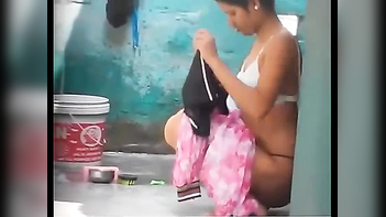 Watch - Desi Village Girl Caught on Camera Taking Outdoor Shower