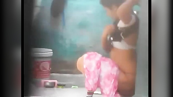 Watch - Desi Village Girl Caught on Camera Taking Outdoor Shower