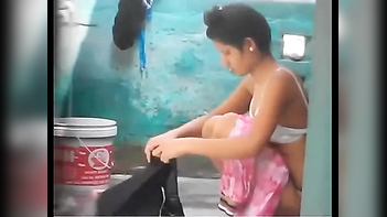 Watch - Desi Village Girl Caught on Camera Taking Outdoor Shower